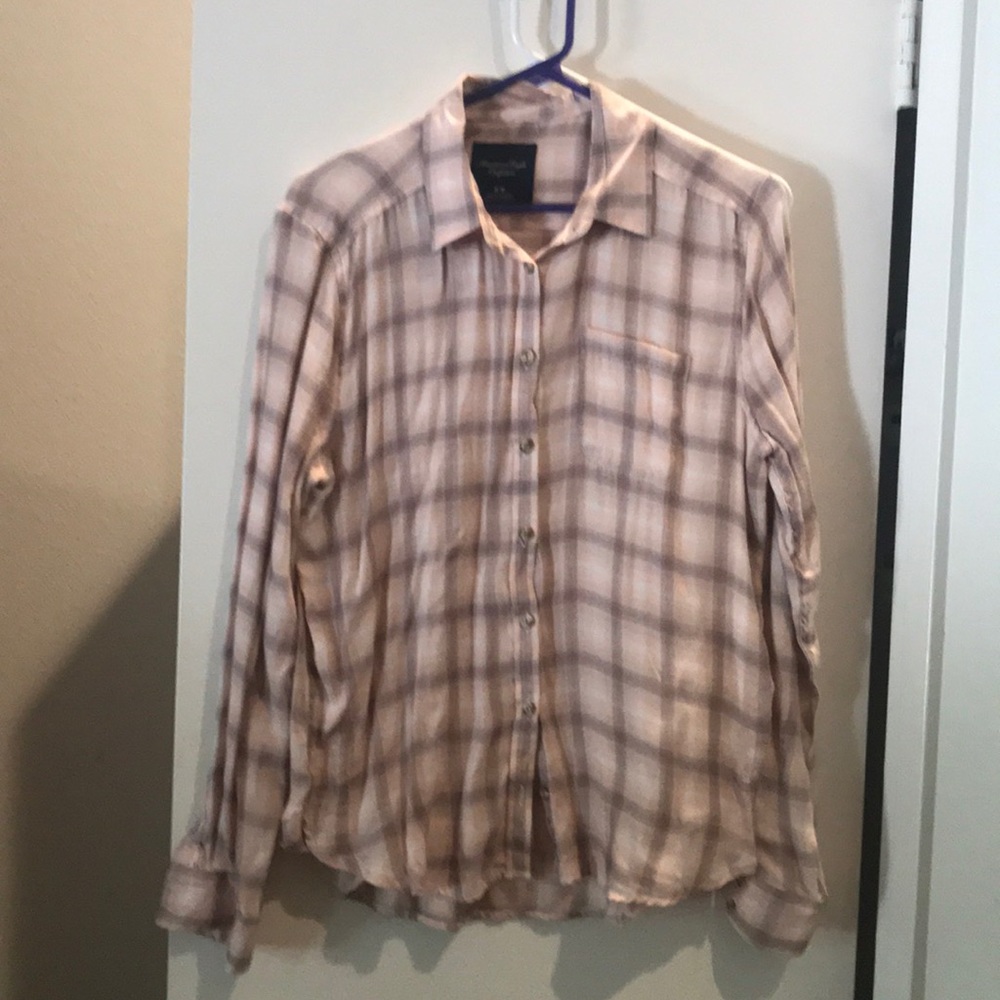 Women’s light weight button up. Pink colored